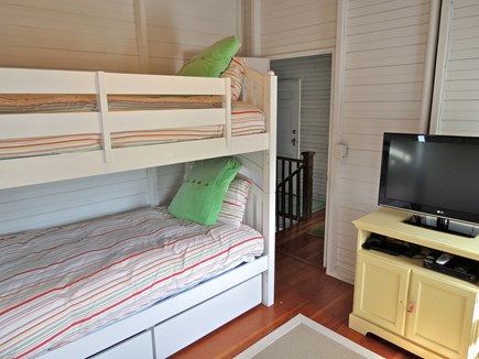 Brewster Cape Cod vacation rental - Another bedroom, this one with bright, playful bunk beds and one of several flat screen TVs in the house.