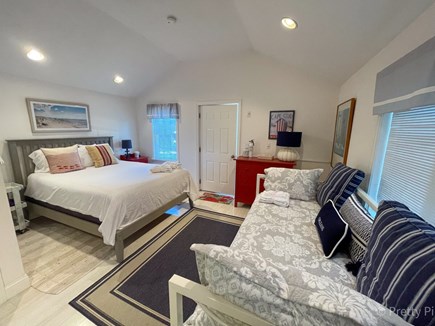 Orleans Cape Cod vacation rental - Guest cottage showing a Queen bed and Twin day bed