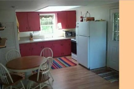 Wellfleet Cape Cod vacation rental - Open kitchen with dining table!
