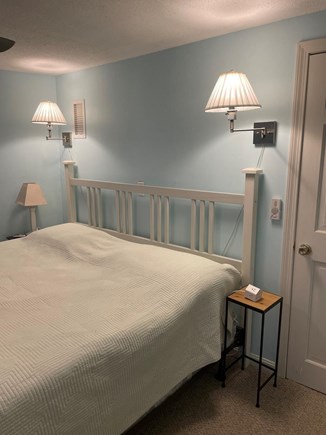 Orleans Cape Cod vacation rental - Downstairs king bedroom - window and patio door views to lake