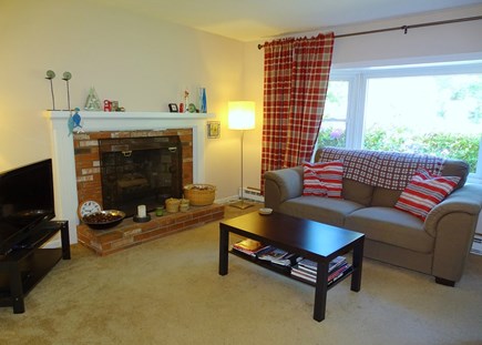 North Eastham Cape Cod vacation rental - Living room offers flatscreen TV, two couches 