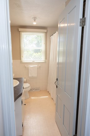 Chatham Cape Cod vacation rental - Downstairs bathroom with shower and bathtub, next to the kitchen