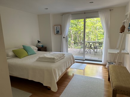 Wellfleet Cape Cod vacation rental - Bedroom with queen bed and slider onto wooded back patio