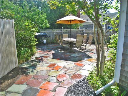 Yarmouth, Bass River Cape Cod vacation rental - Flagstone patio with table & chairs, umbrella and gas grille