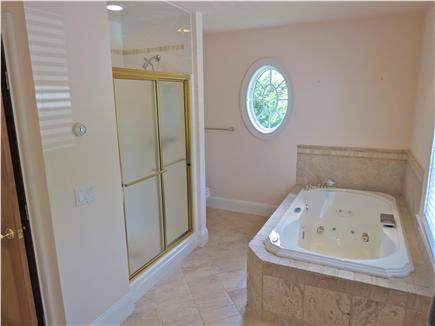 Orleans Cape Cod vacation rental - Here's the master bath with a shower and jetted tub