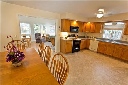 Mashpee Cape Cod vacation rental - Large Eat-In Kitchen Opens to Attached Sunroom and Living Room