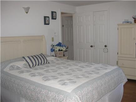 Brewster Cape Cod vacation rental - First floor Master king  bed and armoire