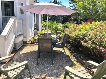 Nauset Heights (East Orleans) Cape Cod vacation rental - Front patio. Privacy hedge.  2 Webers––gas or charcoal.