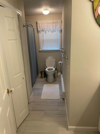 South Dennis Cape Cod vacation rental - Hall Bath with tub and shower and laundry