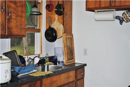 Eastham Cape Cod vacation rental - Kitchen with gas stove and washer/dryer