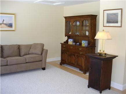 Brewster Cape Cod vacation rental - Library with queen sofa and TV, books videos and games.