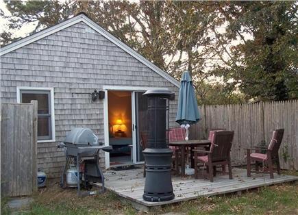 Dennis Port Cape Cod vacation rental - Back patio area with outdoor shower to left.