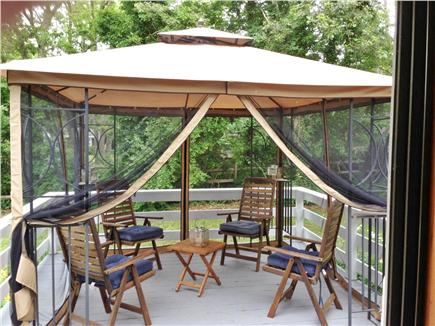Long Pond, Harwich Cape Cod vacation rental - The large deck is covered with mosquito netting- perfect!