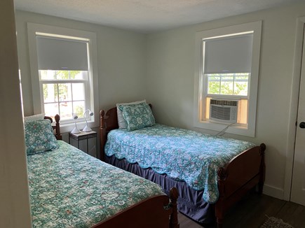 Long Pond, Harwich Cape Cod vacation rental - 3rd bedroom with cross breezes at rear of the house.