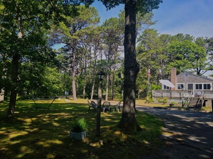 No. Eastham Cape Cod vacation rental - Main Yard with Hammock, Fire Pit, and Room for Yard Games
