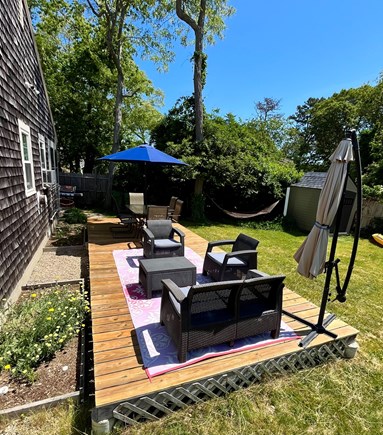 Dennisport Cape Cod vacation rental - View of back deck from far side of yard