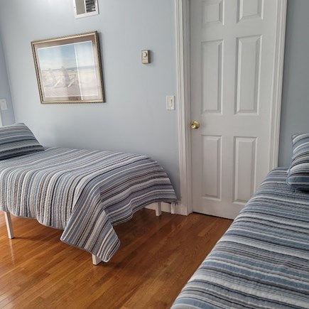 West Yarmouth Cape Cod vacation rental - 2 nd story Bedroom with a Juillet Deck and Patio door