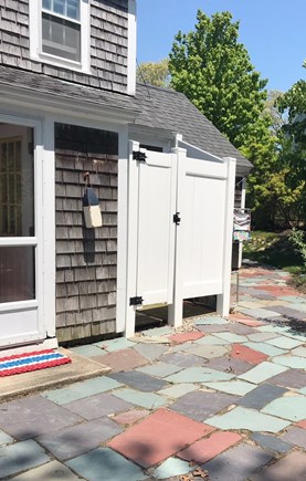 Harwichport Cape Cod vacation rental - Enjoy the patio with outdoor shower, firepit and gas grill.