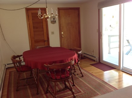 Hyannis/Centerville Cape Cod vacation rental - Dining Room with sliding glass door that opens to the sun deck.