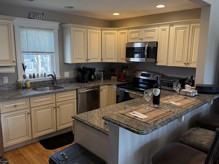 West Harwich Cape Cod vacation rental - View of kitchen from stairs