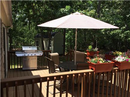 Eastham Cape Cod vacation rental - Deck with gas grill, seating for  and a shed to store your bikes