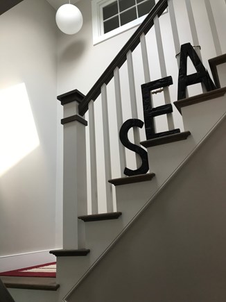 Eastham Cape Cod vacation rental - Stairway to second floor.  The skylight brings the sunshine in!