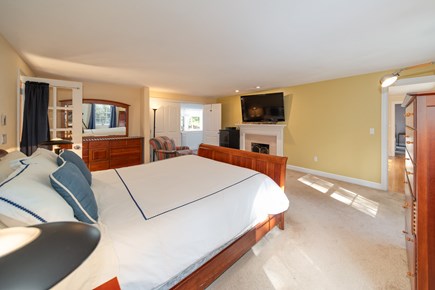 Sandwich, Cape Cod Cape Cod vacation rental - Primary bedroom, w/55' TV, Private bath, soaking tub & shower.