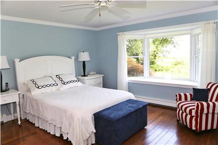 Brewster Cape Cod vacation rental - First floor master with a bathroom off to the left.