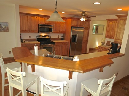 Harwich Cape Cod vacation rental - The well-equipped kitchen has newer appliances and a breakfast bar