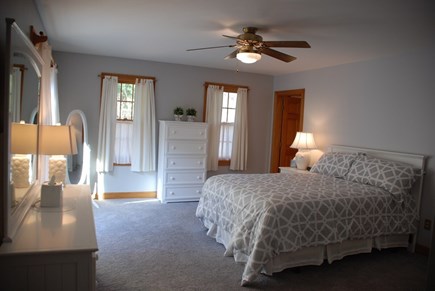 Harwich Cape Cod vacation rental - The main level primary bedroom with queen bed