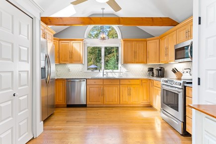 Brewster Cape Cod vacation rental - Updated kitchen with  countertops and stainless steel appliances.