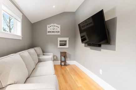Brewster Cape Cod vacation rental - Second floor TV lounge at the top of the stairs.