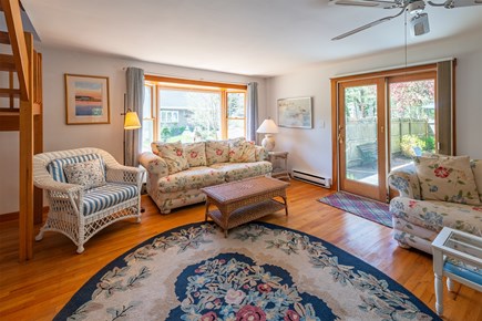 Chatham Cape Cod vacation rental - Living room with slider to the deck and patio.