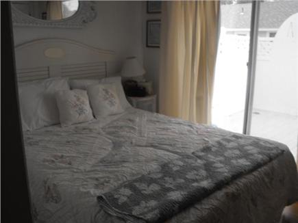 Dennisport Cape Cod vacation rental - Master queen bed with bath and deck off bedroom