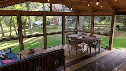 Eastham (National Seashore) Cape Cod vacation rental - Morning coffee on the couch, dinner at the outdoor dining table.