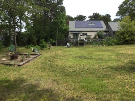 South Orleans Cape Cod vacation rental - Backyard view of solar panels