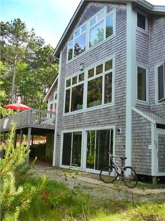 Wellfleet Cape Cod vacation rental - Back of the house with path leading to Gull Pond
