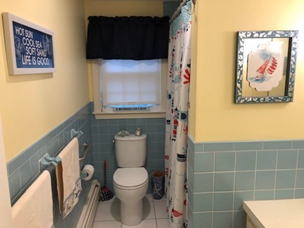 South Yarmouth Cape Cod vacation rental - The main bathroom has a tub, shower and heat lamp, too.
