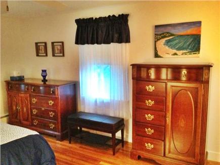 South Yarmouth Cape Cod vacation rental - Comfortable furnishings for relaxation (bed, bench & 2 bureaus).
