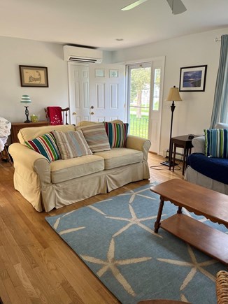 Brewster Cape Cod vacation rental - Open concept living room, AC split-wall unit and big comfy couch