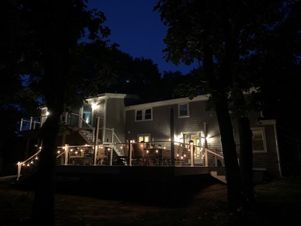 Falmouth - Seacoast Shores Cape Cod vacation rental - Back deck with market lighting