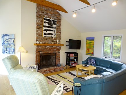 Eastham Cape Cod vacation rental - Vaulted living room with large sectional couch and flat screen TV