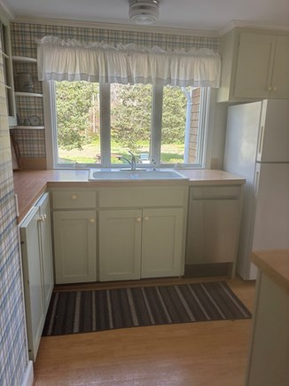 Eastham Cape Cod vacation rental - Kitchen, looking out to large, private, backyard