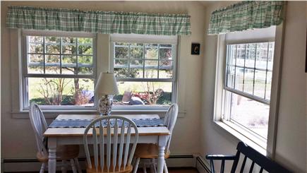 Eastham Cape Cod vacation rental - Dining room overlooking patio and gardens- so private