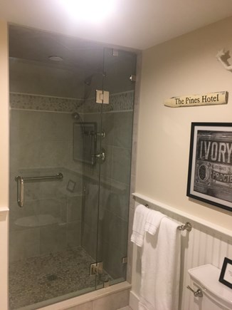 Cotuit Cape Cod vacation rental - This shower has a pebble floor, hand held shower and teak seat.