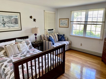South Dennis Cape Cod vacation rental - First floor guest room with seating.