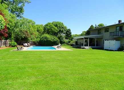 East Falmouth Cape Cod vacation rental - Back of house showing pool and outdoor shower