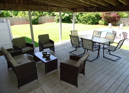 East Falmouth Cape Cod vacation rental - Large deck with dining and seating, grill