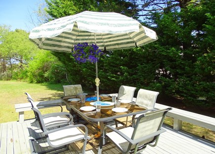 eastham Cape Cod vacation rental - Deck with dining area, grill, private backyard