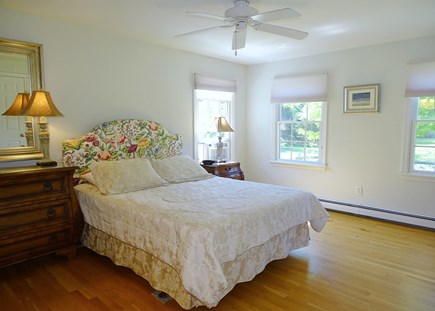 eastham Cape Cod vacation rental - Main floor master bedroom with queen bed, TV, ceiling fan